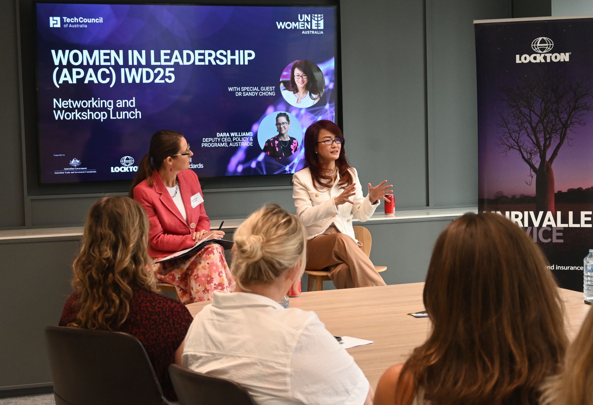 Ms Dara Williams and Dr Sandy Chong speaking with attendees at the Tech Council’s Women in Leadership event.